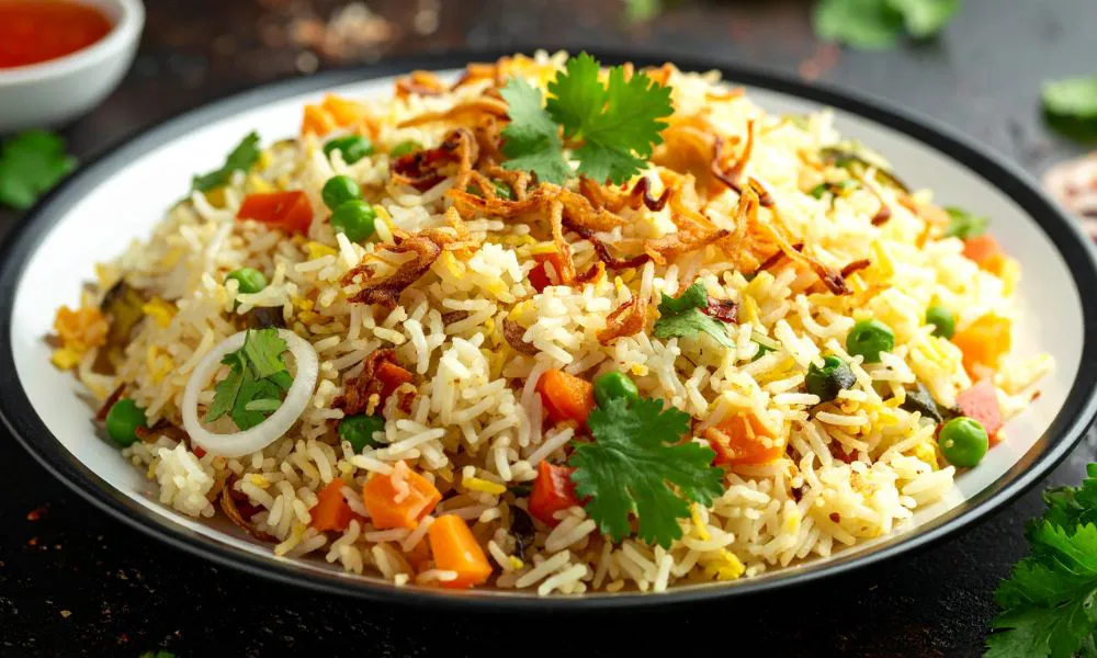 Vegetable fried rice topped with crispy shallots and fresh cilantro at Good Alley, a Chinese restaurant in Arcadia